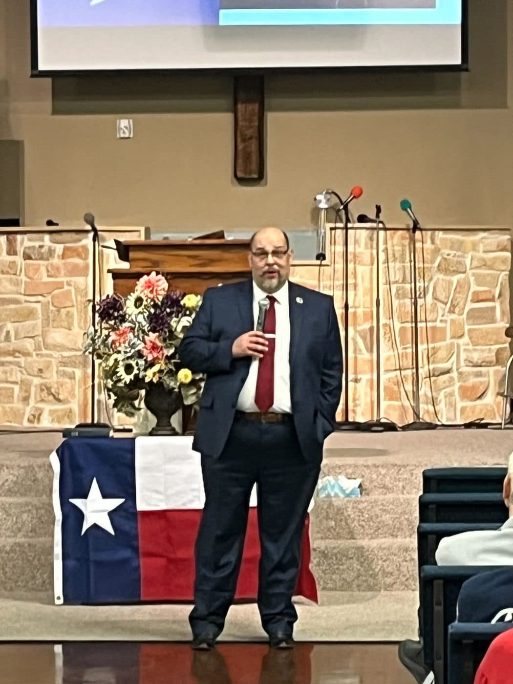 Daniel Miller making the case for Texas independence at a podium